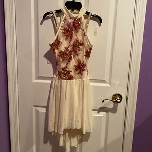 Dance costume in ivory with pink sequins